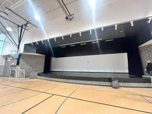 Commercial auditorium stage painting in Michigan