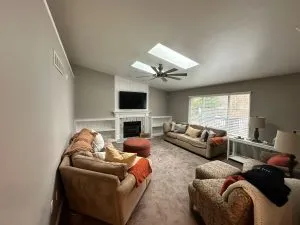 Interior living room painting with skylight in Michigan home