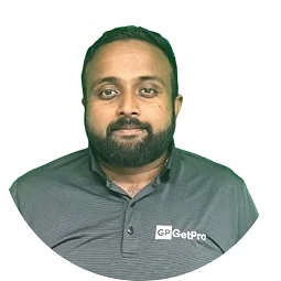 Professional portrait of an estimator from GetPro Painting, wearing a branded shirt, showcasing expertise in quality painting services.