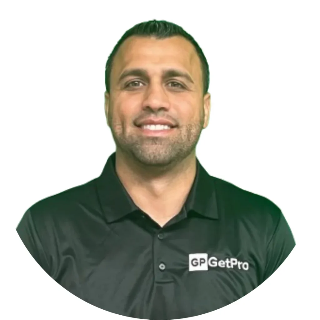 Smiling man in a black polo shirt with "GetPro" logo, representing GetPro Painting's management team.